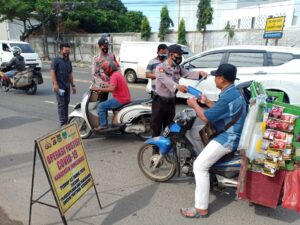 Hadapi Libur Panjang, Polresta Tangerang dan 3 Pilar Bagikan 27.659 Masker di 114 Lokasi