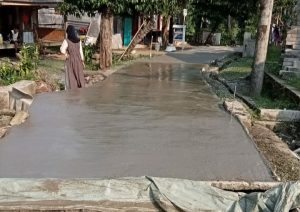 Jalan JUT di Desa Pudar Diduga Kurangi Volume Pekerjaan