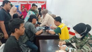 HUT TNI Ke-79, Kodim 0602/Serang Gelar Pengobatan Massal dan Bagikan Sembako 
