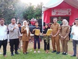 Kapolsek Walantaka Gelar Lomba Panjat Pinang